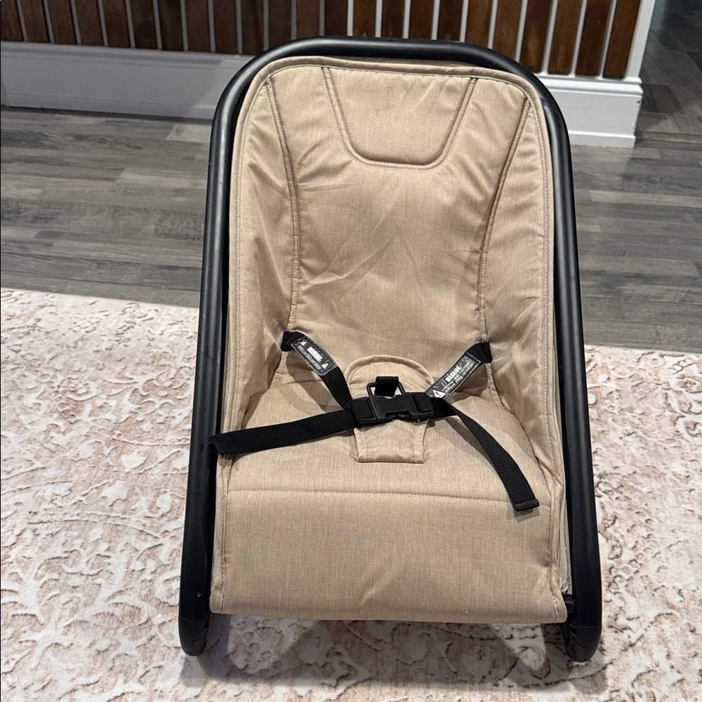 Tan Baby Bouncer with Black Frame